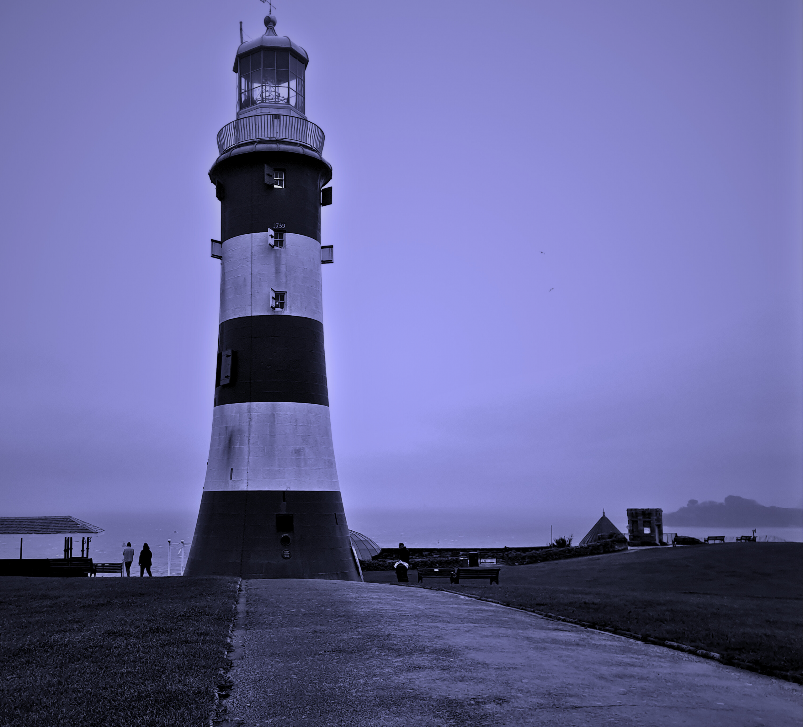 Smeaton's Tower lighthouse against a dark sky, representing our Plymouth base.